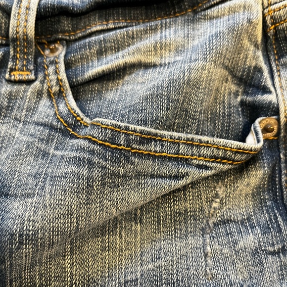 Torrid Blue Flare Jeans with Distressed Details - Picture 6 of 11